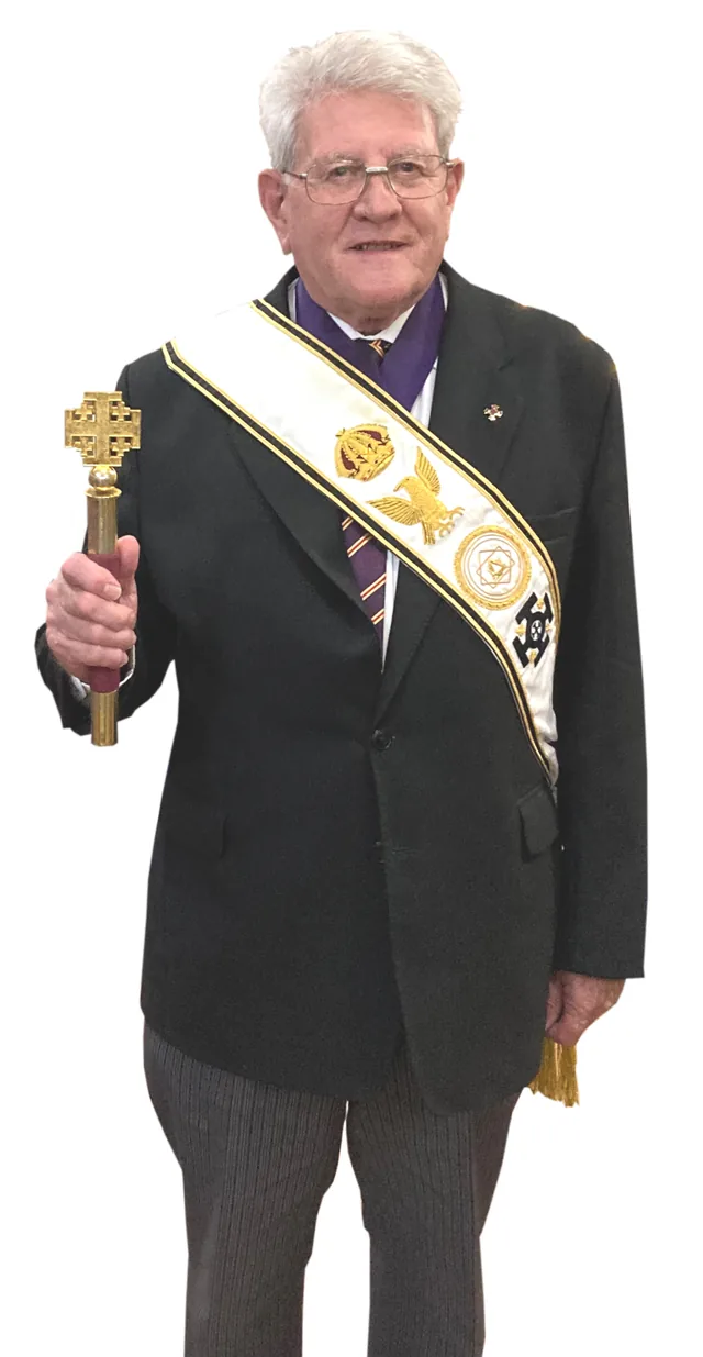 Ill.Kt. Tony Mason, Deputy Intendant General, in regalia holding a Jerusalem cross staff